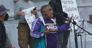 Melody Davis speaks at a demonstration before the Planning Commission meeting at Oakland City Hall on Jan. 19, 2022, at a rally opposing Oakland A’s owner John Fisher’s real estate and stadium development of Howard Terminal. Photo courtesy of Gene Hazzard.