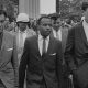 James Meredith walking on the campus of the University of Mississippi, accompanied by U.S. marshals. (Photo: Marion S. Trikosko, the United States Library of Congress.)
