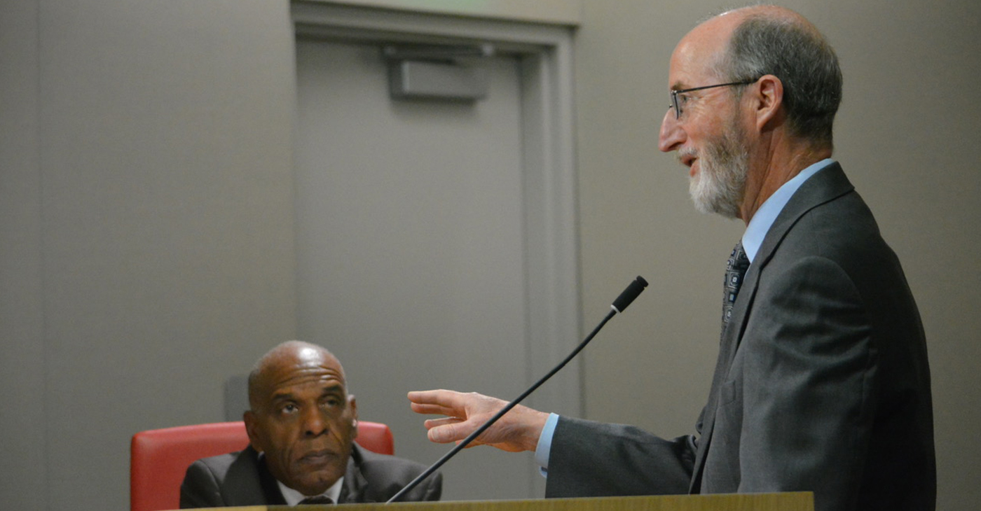 Sen. Steven Bradford (D-Inglewood), seated, listens to Sen. Steve Glazer (D-Contra Costa), at the podium, present a bill that would impose fees on major digital technology companies to fund local newsrooms in the state. The Senate Revenue and Taxation Committee voted 4-1 to approve SB 1327 on May 8, 2024. CBM photo by Antonio Ray Harvey.