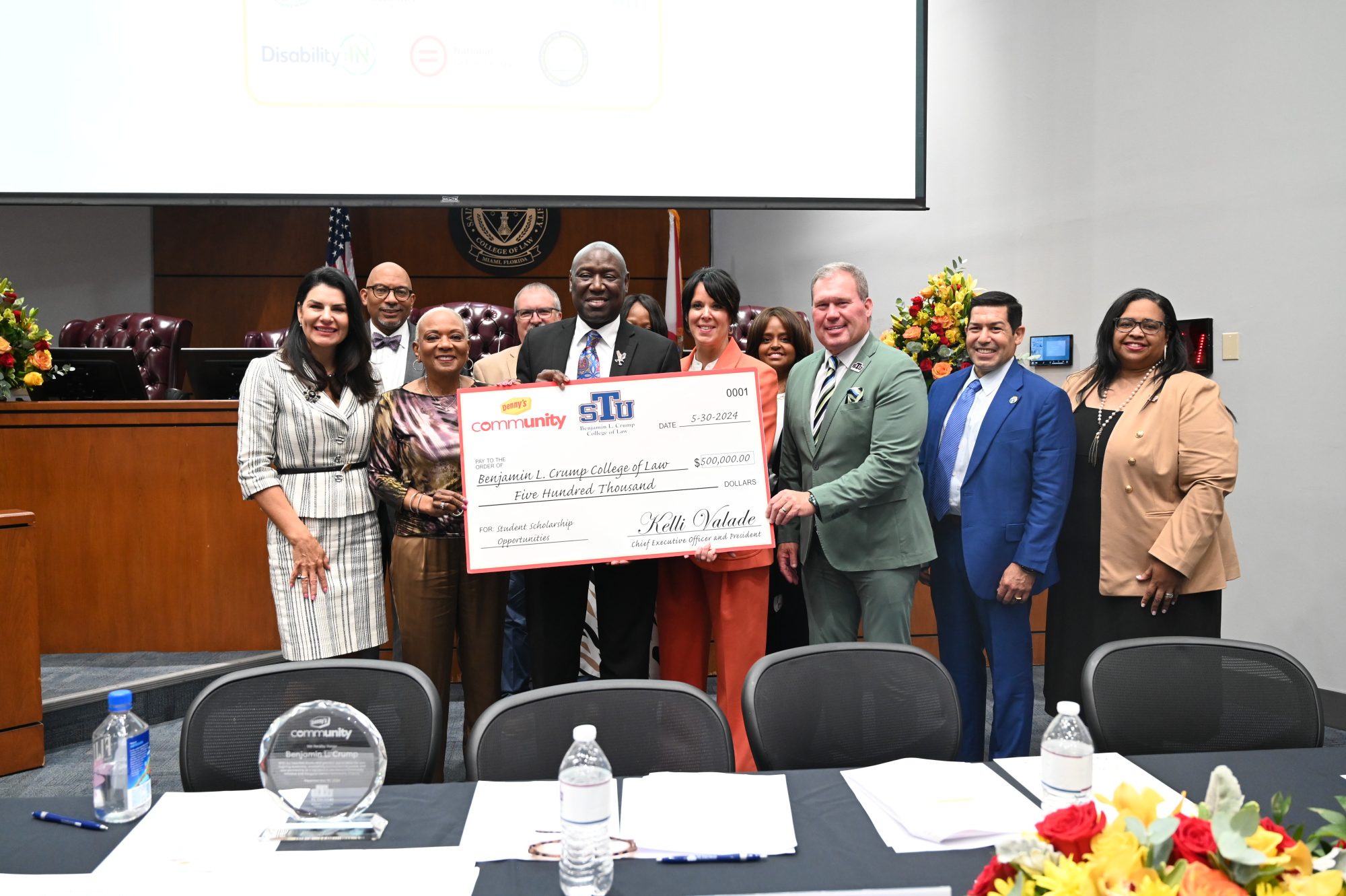 As part of Denny’s launch of its nationwide Community Alliance, a scholarship gift of $500,000 was given to the St. Thomas University Benjamin L. Crump College of Law. Crump accepted the donation from Denny’s in support of the College of Law’s commitment to social justice.Pictured (l-r): Dean Tarlika Nunez-Navarro, Benjamin L. Crump College of Law; Randy Brown, Denny’s Senior Manager, Business Diversity; Brenda J. Lauderback, Chair, Board of Directors, Denny’s Inc.; Michael Whitacre, Denny’s Director of Franchise Operations; Benjamin L. Crump; Gail Sharps Myers, Denny’s Executive Vice President, Chief Legal and Administrative Officer; Kelli Valade, Denny’s CEO and President; Fasika Melaku-Peterson, Denny’s Senior Vice President, Chief Learning and Development Officer; President David A. Armstrong, St. Thomas University; Nader Talebzadeh, Denny’s Director of International Operations; April Kelly-Drummond, Denny’s Vice President, Chief Inclusion and Community Engagement Officer