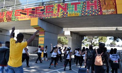 The 2022 Richmond Juneteenth Parade passes through the Juneteenth Freedom Underpass Mural at S. 37th St. en route to the festival grounds at Nicholl Park. Richmond Standard photo.