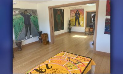 Artworks hang in The Center for ArtEsteem's new space at 3111 West St. in West Oakland on June 24. Photo by Zack Haber.