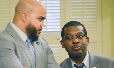Asm. Corey Jackson 9D-Moreno Valley), right, has a brief conversation with Asm. Issac Bryan (D-Ladera Heights), left, on the Assembly floor at the State Capitol on June 27 after Jackson has a near confrontation with Asm. Bill Essayli (R-Corona). CBM photo by Antonio Ray Harvey.