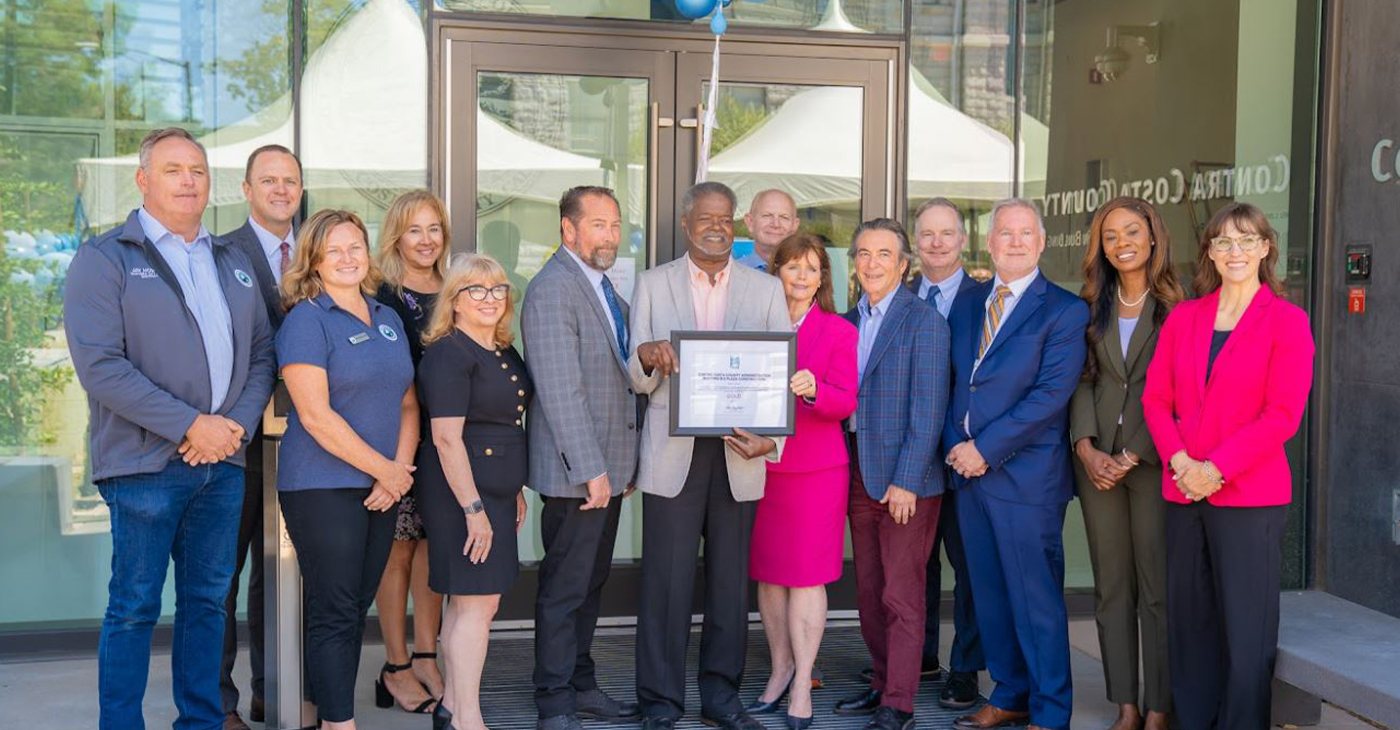 Count officials pose in front of the new Administration Building at 1025 Escobar St. in Martinez. Photo courtesy Contra Costa County.