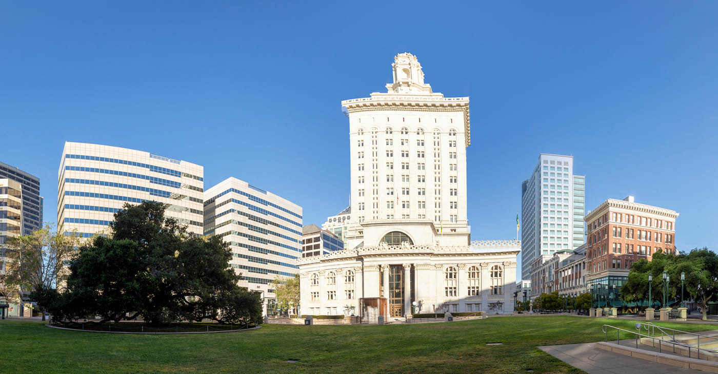 Oakland City Council passed a risky budget that is contingent on the $105 million sale of the Coliseum stadium, but if it falls through, drastic cuts will have to be made across the city in order to make up for the loss. Downtown Oakland. Photo by Travelview.