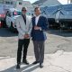 Founding ICAC President Pastor Ken Chambers, left, and Dr. Kenneth Anderson, first vice president of the state Baptist Convention and pastor of Williams Chapel Baptist Church, pose in front of the trailers that need renovation. Photo by Kevin Hicks, Hicks Media.