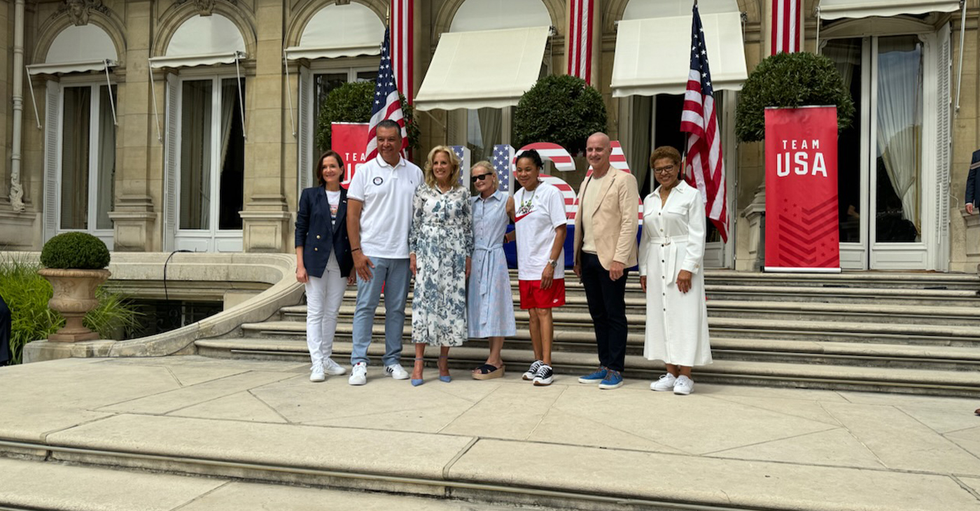 First Lady Jill Biden stands with some members of the U.S. delegation to the Paris 2024 Olympic Games.