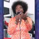 Sharika Gregory talking about relational issues at the Barbers Garages in San Rafael. Photo by Godfrey Lee.