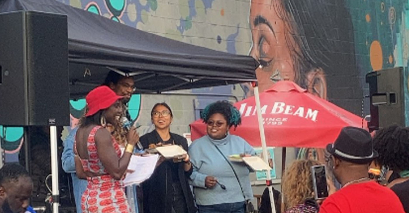 About 150 people came to the Jollof Festival to sample plates and cheer on the contestants. Photo by Daisha Williams.