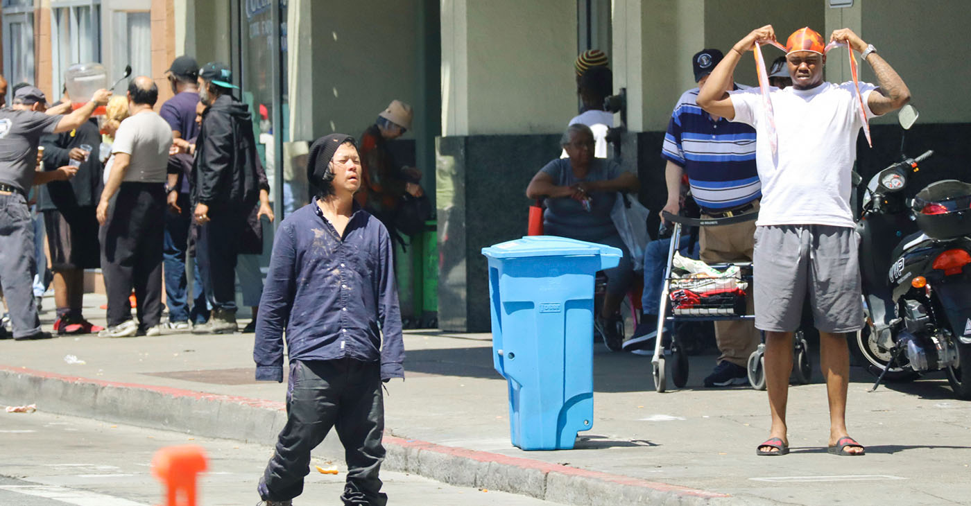 SAN FRANCISCO, CA USA May 6, 2018: People line up for services outside Tenderloin Housing Clinic. The neighborhood is symbolic of San Francisco’s homelessness issues. iStock photo.