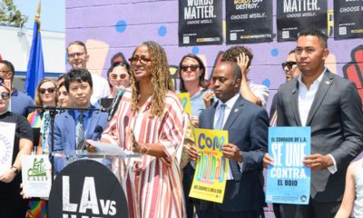 Standing next to Tony Thurmond, LA County Supervisor Holly J. Mitchell, Second District, speaks at the podium surrounded by local representatives, school officials, parents, students and the community on Thursday, August 8, 2024.