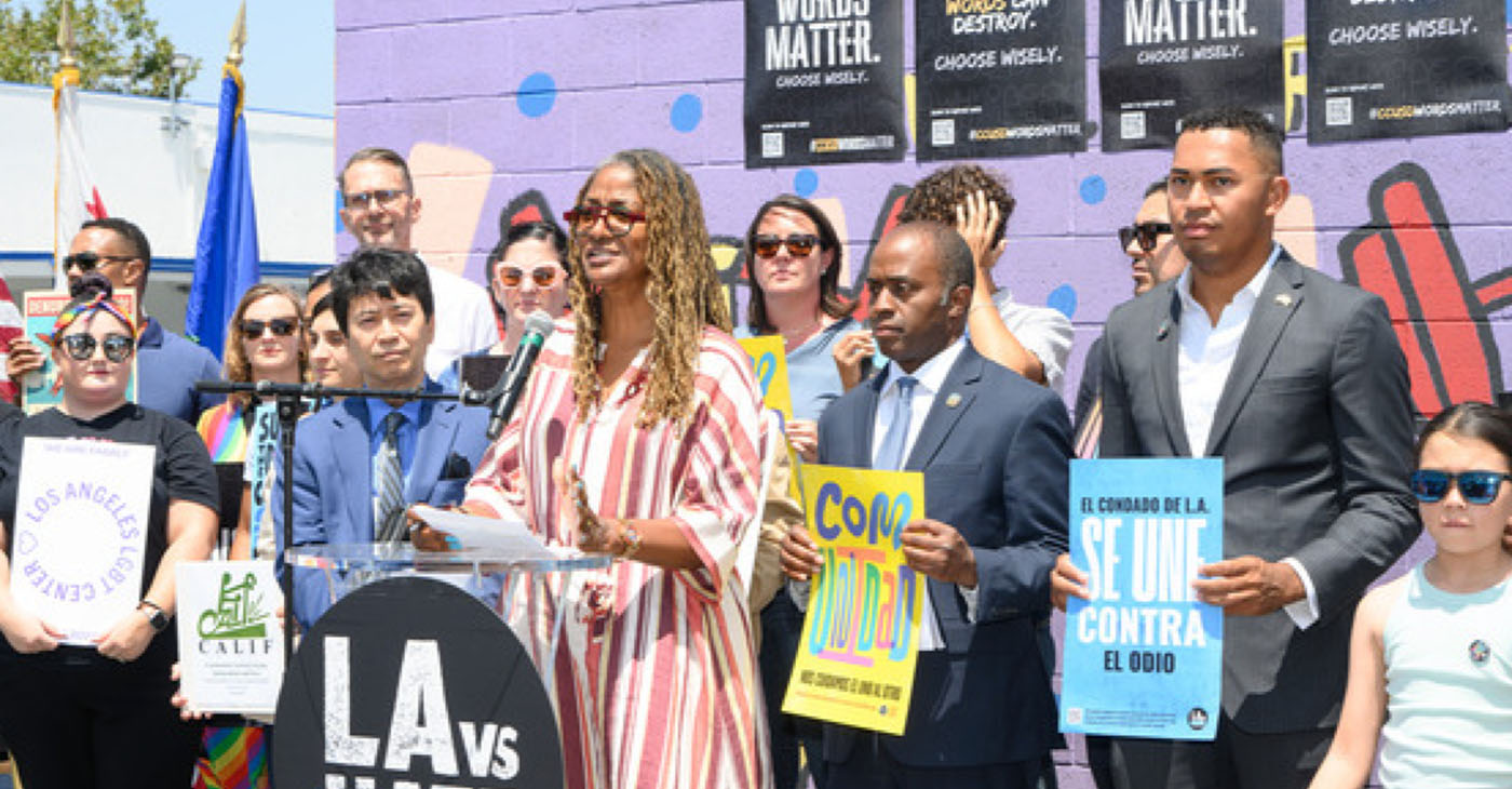 Standing next to Tony Thurmond, LA County Supervisor Holly J. Mitchell, Second District, speaks at the podium surrounded by local representatives, school officials, parents, students and the community on Thursday, August 8, 2024.