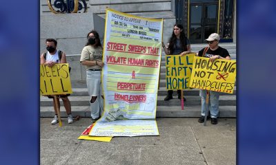 San Francisco homelessness advocates held a rally in front of City Hall to issue a symbolic citation to Mayor London Breed to stop sweeping encampments. Photo by Magaly Muñoz.