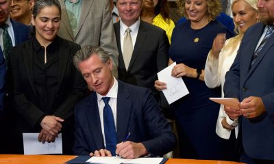 San Jose, CA - Aug 16, 2024: Governor Gavin Newsom signing 10 new bills, groundbreaking legislation aimed at combating retail crime in California. (Shutterstock) By Eric Harris, Special to California Black Media Partners