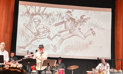 John Calloway, grandson of John W. Calloway, plays flute at the Oakland Museum event. Photo courtesy of Emil Guillermo.