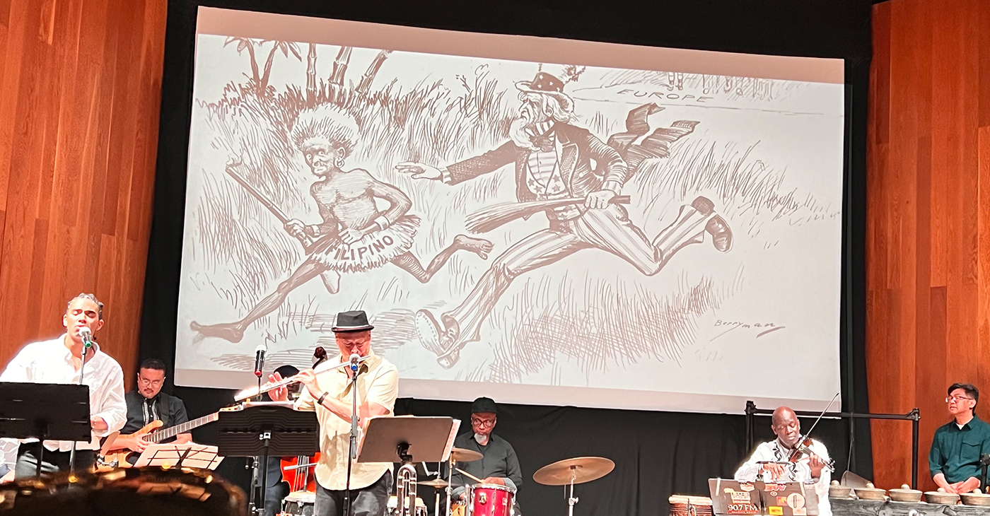 John Calloway, grandson of John W. Calloway, plays flute at the Oakland Museum event. Photo courtesy of Emil Guillermo.