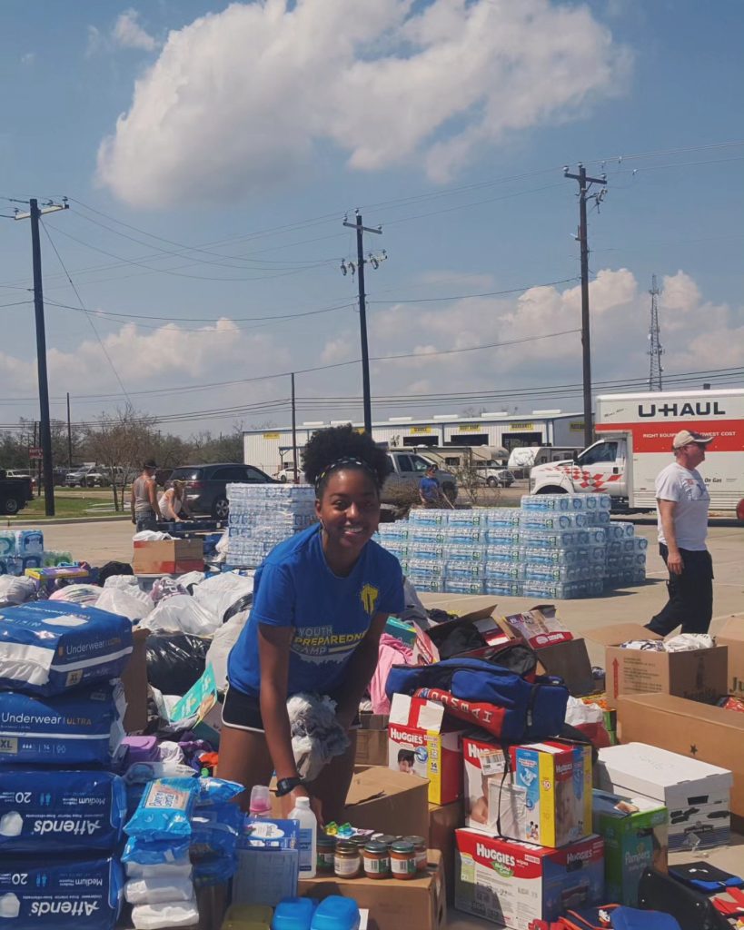 Keyanna co-managed a recovery center with her mother after Hurricane Harvey. They packed essentials, such as diapers, food, and water for families in need. Courtesy photo.