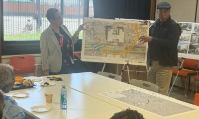 77th and Bancroft architects Art Clark and Patricia Wells discuss project plans with seniors at the East Oakland Senior Center.