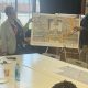 77th and Bancroft architects Art Clark and Patricia Wells discuss project plans with seniors at the East Oakland Senior Center.