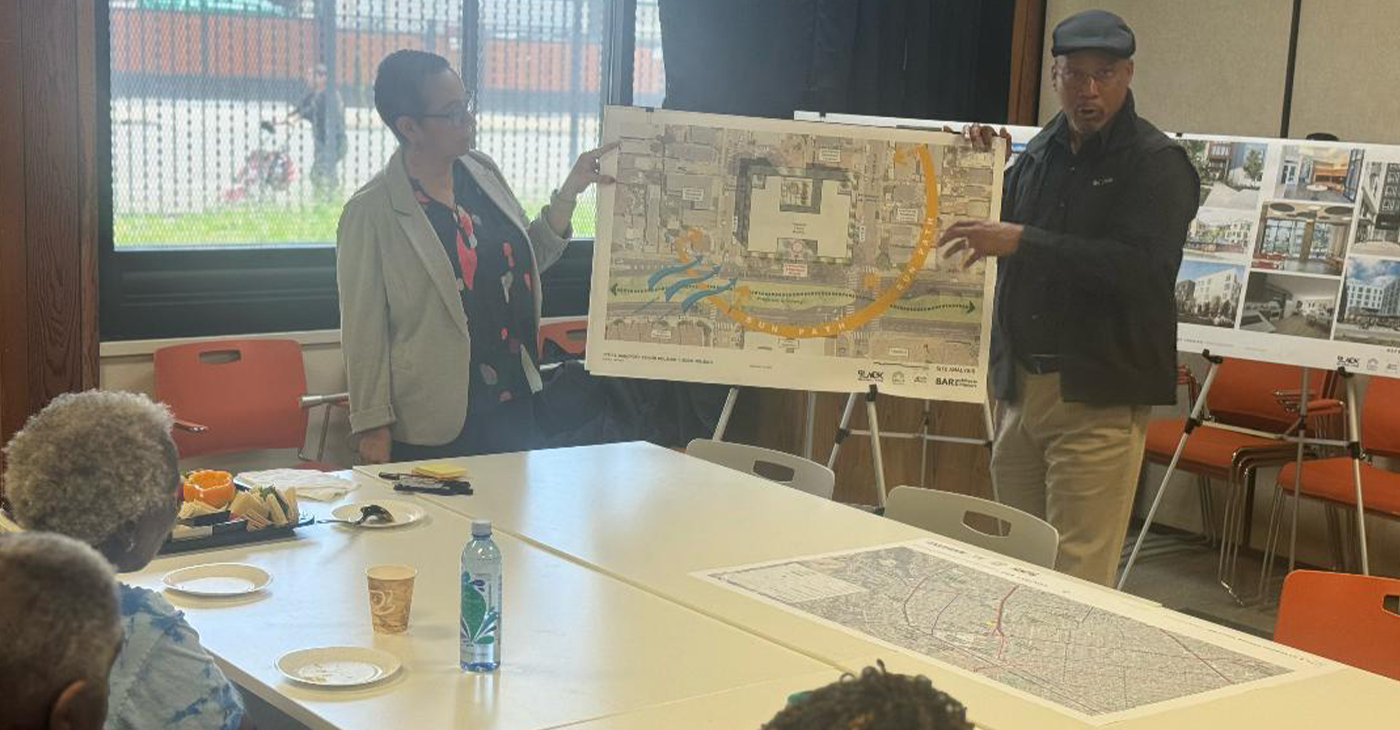 77th and Bancroft architects Art Clark and Patricia Wells discuss project plans with seniors at the East Oakland Senior Center.