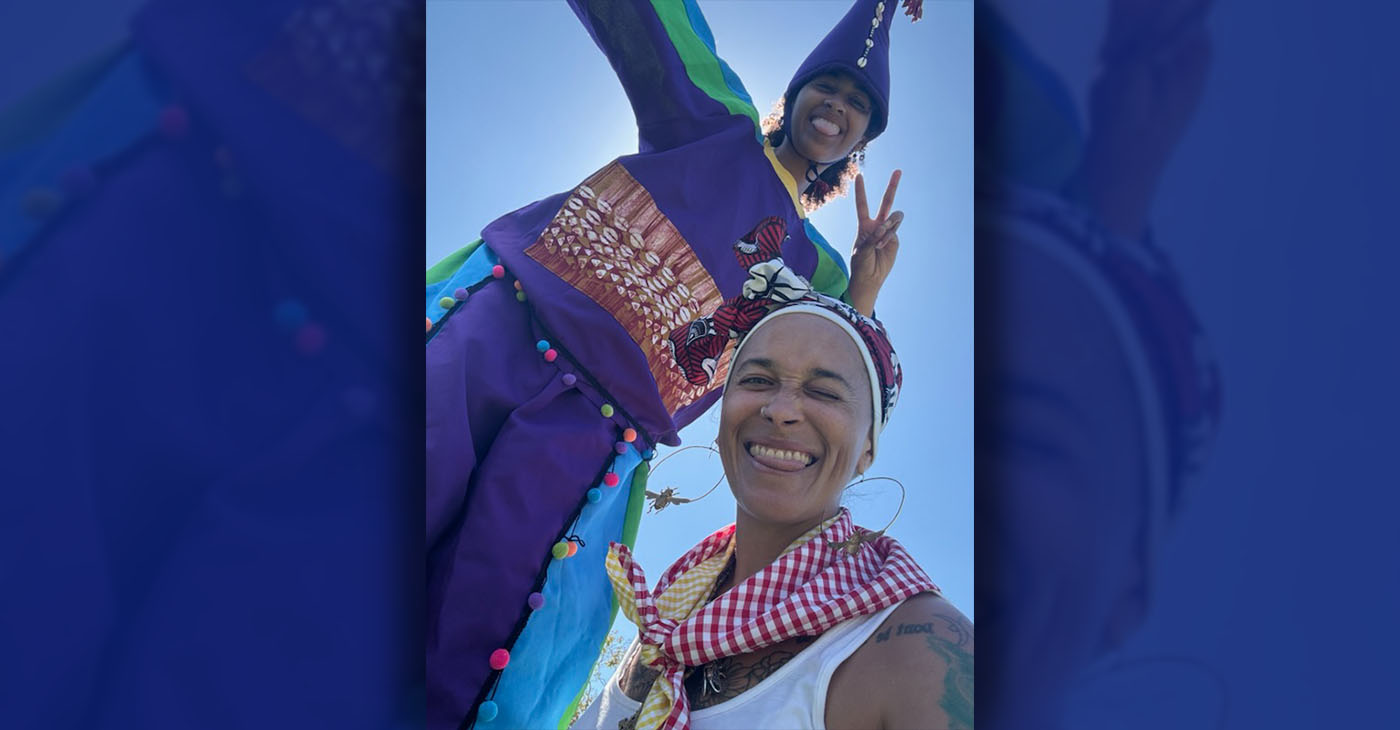 Mandisa Snodey, a volunteer at the festival, smiles with her daughter Amina, a member of the Prescott Circus which performed at the festival. Courtesy photo.