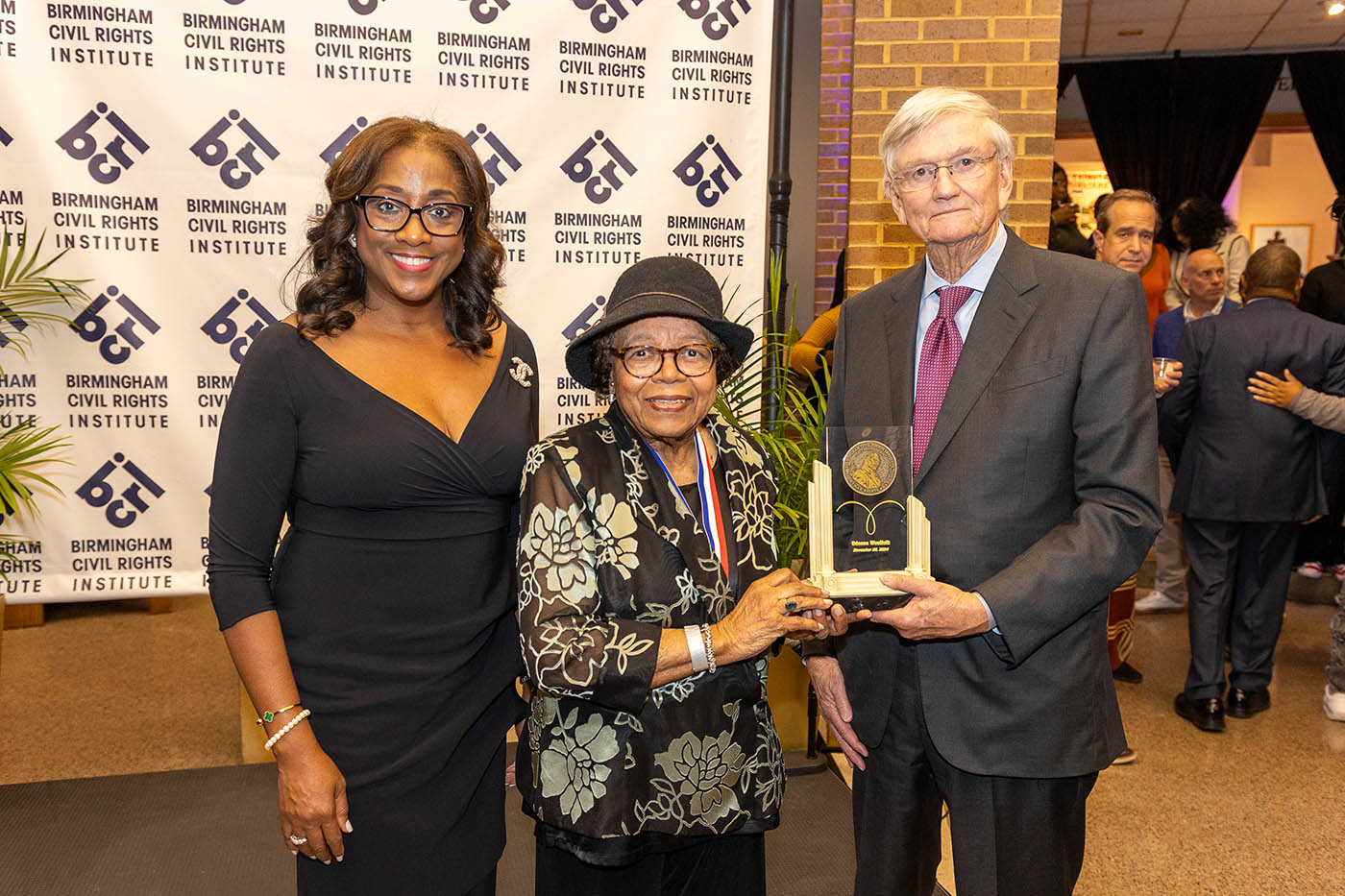 Odessa Woolfolk, center, renowned educator, civic leader and lifelong advocate for Civil and Human Rights and the 2024 Fred L. Shuttlesworth Human Rights Award winner with Rosilyn Houston, Birmingham Civil Rights Institute Board Chair; and Mike Goodwich, (Mike & Gillian Goodrich Foundation) at the Birmingham Civil Rights Institute’s 32nd Anniversary Celebration. (Provided)