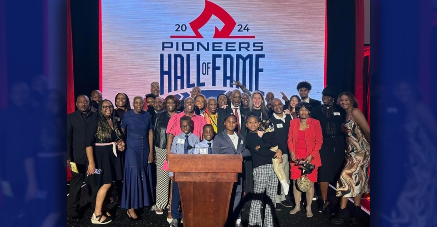 Honoree Lorenzo Hall of CSUEB's Men's Basketball Team 1986-1990 surrounded by his family at the CSUEB 2024 Pioneer Hall of Fame Gala at the Pioneer Gymnasium in Hayward, California. Photo Courtesy of Dr. LaQuitta Simms.