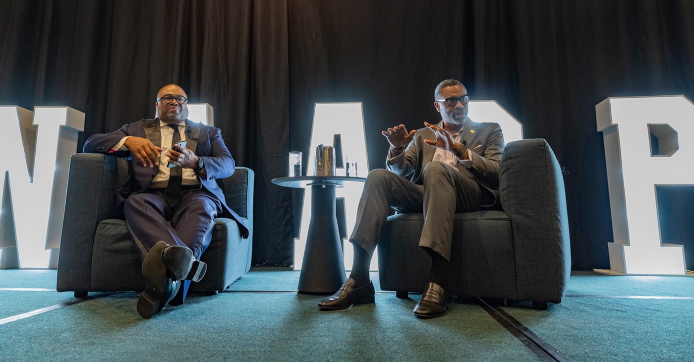 NAACP State Conference President Rick Callender (right) engages in a discussion on voter engagement and community advocacy with NAACP President and CEO Derrick Johnson during the 37th NAACP California-Hawaii State Convention in Los Angeles. Photo by Rich Woods.