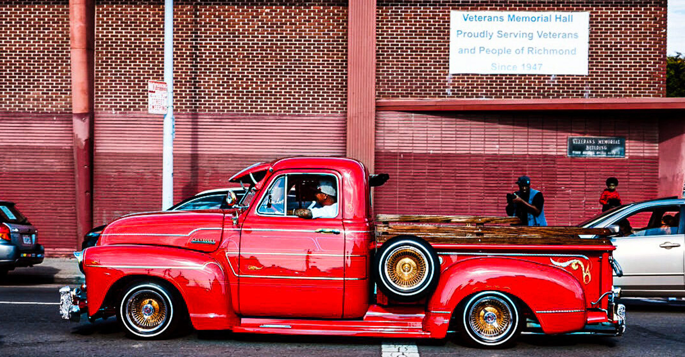 Photo of red lowrider by Jesus “Frisco Lens” Coba.