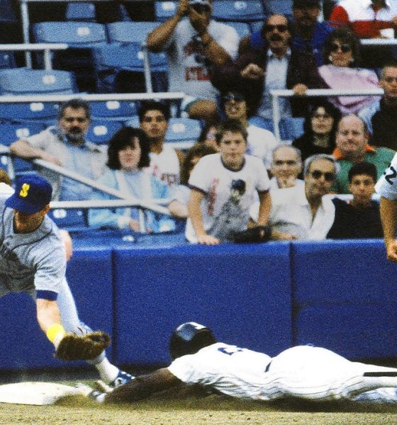 Baseball great Rickey Henderson in the act of stealing one of the 1,406 bases he stole in his 25-year career. Photo: Wikimedia Commons.