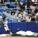 Baseball great Rickey Henderson in the act of stealing one of the 1,406 bases he stole in his 25-year career. Photo: Wikimedia Commons.