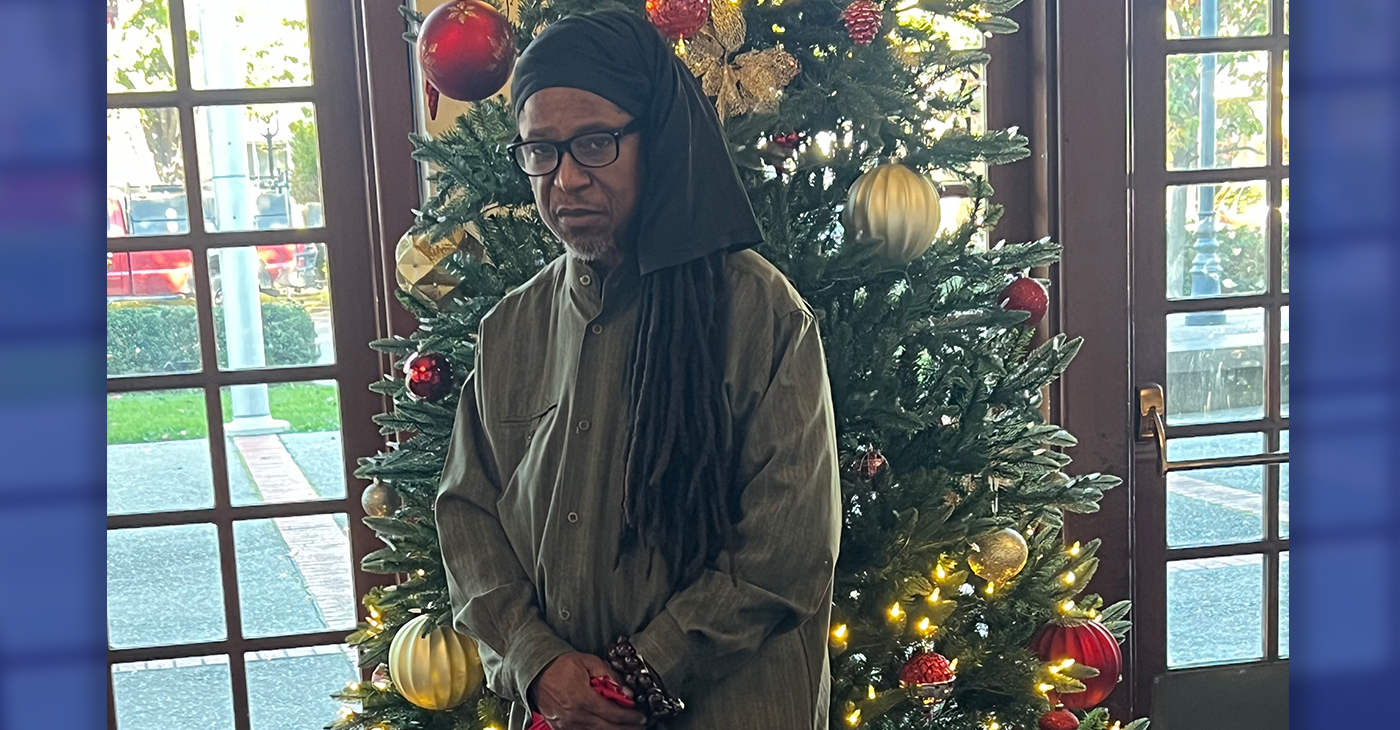 Damon “Shuja” Johnson at an Alameda County Behavioral Health Care Services Holiday Cultural Event for the Office of Peer Support Services. Courtesy photo.