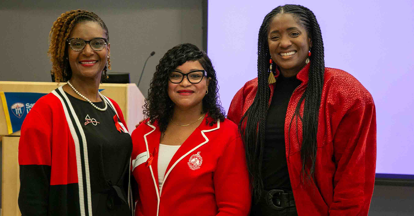 Petrina A. Perteet, Takija Gardner and Oakland City Councilmember Treva Reid at the World AIDS Day event on Dec. 1. Photo by Kevin Hicks.