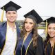 Lester Cedeño, left, and Jamie Hernandez, both of San Bernardino, California, pose with Monica Gomez of Vallejo, right, after the graduation ceremony. Photo by Keegan Houser/UC Berkeley.