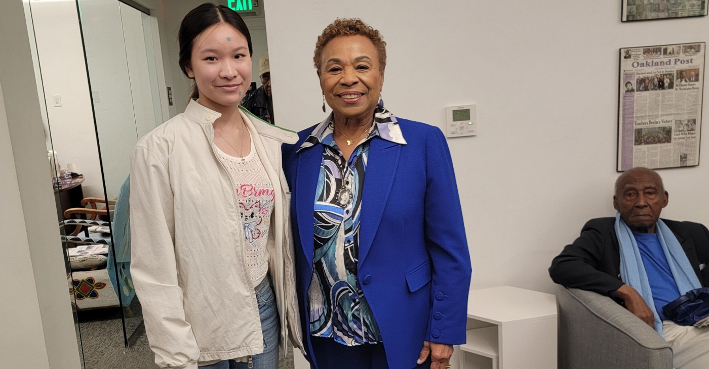 Former Congresswoman Barbara Lee with Oakland School for the Arts student Anka Lee, who is an intern at The Post. Photo by Kevin Hicks.