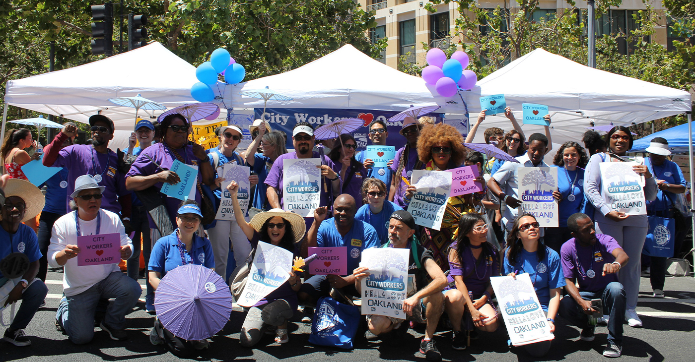 City of Oakland workers celebrate at Oakland festival.