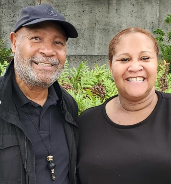 At the Oakland Museum of California, Emory Douglas, previously the Black Panther Party Minister of Culture, poses with his daughter artist Meres-Sia Gabriel, creator of the “I Was There Too” multimedia production. Photo by Carla Thomas. v