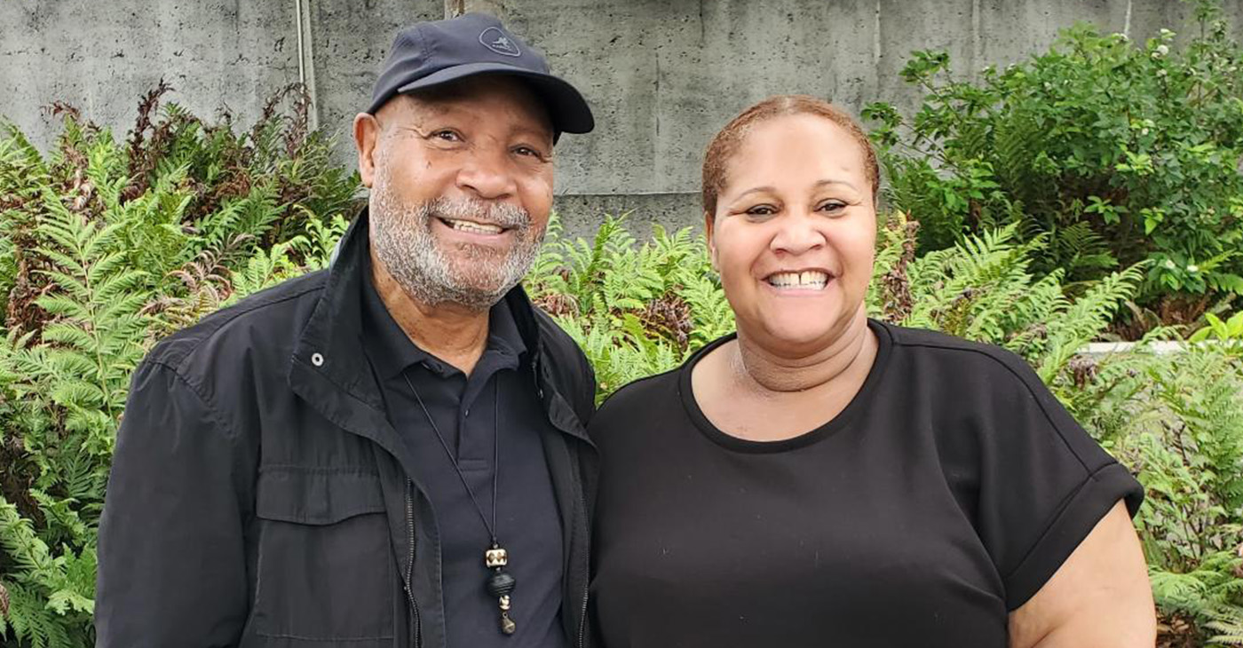 At the Oakland Museum of California, Emory Douglas, previously the Black Panther Party Minister of Culture, poses with his daughter artist Meres-Sia Gabriel, creator of the “I Was There Too” multimedia production. Photo by Carla Thomas. v