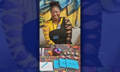 Health worker Ebony Atlas distributes information about the OMI Family Center's IMANI Program in San Francisco. The organization participated in the inaugural San Francisco Hip Hop Festival at the Midway in San Francisco. Photo By Carla Thomas.