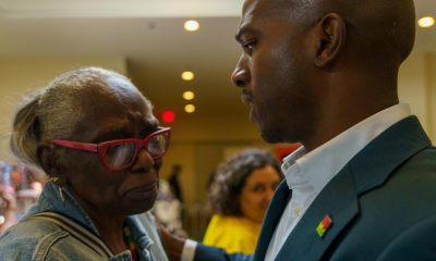 Dianne Lewis receives a word of support from Pasadena City Councilmember Tyron Hampton. Photo by Solomon O. Smith.