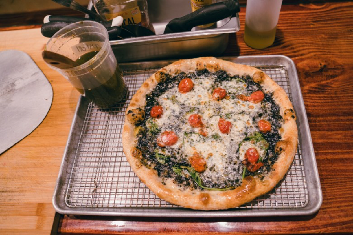 Dolo’s Pizza (above) infuses Caribbean flavors into its recipes, creating unique pies. Photo by Tabius McCoy The Atlanta Voice