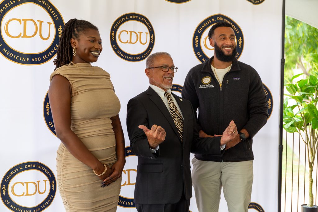 Dr. David Carlisle (center), President of Charles R. Drew University of Medicine and Science (CDU),  with two of the university’s students. Photo Courtesy of Charles R. Drew University of Medicine and Science. 