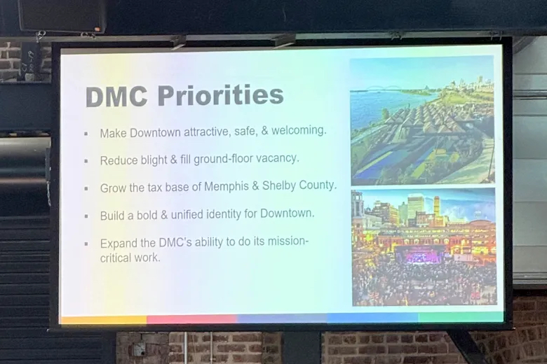 A slide highlighting the Downtown Memphis Commission’s priorities — including making downtown safe, attractive and welcoming — is shown during New Memphis’ Celebrate What’s Right: Activating a Vibrant Downtown luncheon Nov. 5 at The Kent. The presentation emphasized continued investment in downtown growth and community engagement. (Candace Gray/Tri-State Defender)